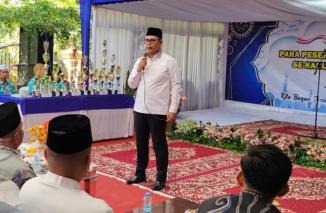 Bupati Solok Capt. H. Epyardi Asda, Dt. Sutan Majo Lelo, M. Mar membuka Lomba Yasinan dan Qasidah Rabana se-Kabupaten Solok. (Sumber : Istimewa)