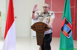 Pj Wali Kota Padang, Andree Algamar, secara resmi membuka Rapat Koordinasi Pengadaan Barang/Jasa yang diselenggarakan pada Selasa, (21/1/2025). (Foto: Ist)