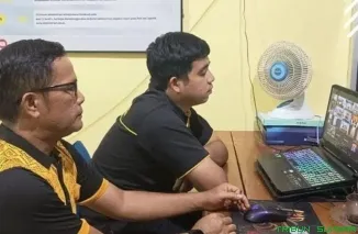 Kasubsi PIDM IPDA Doni Santoso dan Bamin Si Humas Briptu Mhd. Syukri YH. B. (Foto: Ist)