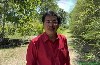 Ketua APHI Riau, Muller Tampubolon, memberikan klarifikasi terkait pertemuan Bupati Siak Afni Zulkifli dengan manajemen PT SSL di Pekanbaru. (Foto: Ist)