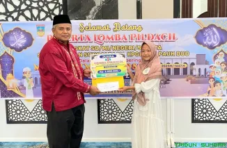 Dhia Ratu Melldina, siswi SDN 04 Bariang Rao-Rao, meraih Juara 1 Pildacil Maulid Nabi 2025 di Masjid ZBA Muara Labuh, Solok Selatan. (Foto: Ist)