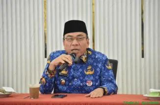 Wakil Wali Kota Padang Maigus Nasir memimpin rapat konsolidasi perdana pengurus LPTQ Kota Padang di Aula DKK. (Foto: Ist)