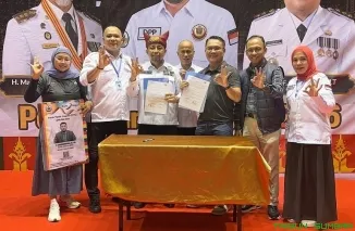 Penandatanganan kerja sama antara Bank Nagari dan Ikatan Keluarga Minang (IKM) di Pekanbaru, Sabtu (20/6/2026). (Foto: Ist)