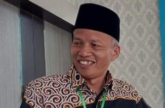Ini Dr Bakhtiar ketua PW Muhamamdiyah Sumbar, dipilih lewat Muswil. yang kondusif, Taslim ucapkan selamat, Senin 26 Desember 2022. (dok) 