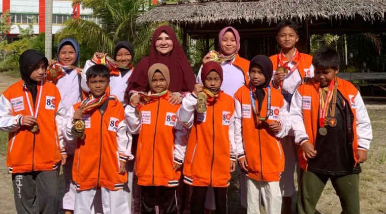 Teks Foto : Hj. Nevi Zuairina Ajak Generasi Muda Menjadi Garda Kepemimpinan Masa Depan. IST