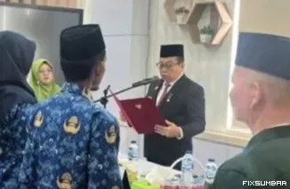 Teks Foto : Pj Sekda Dharmasraya Klarifikasi Soal Pelantikan Pejabat. IST